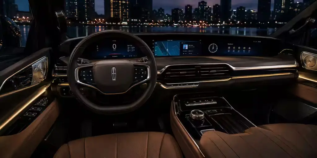 Rear cabin of a Lincoln Navigator with the seats and lighting